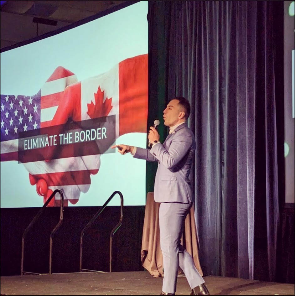 Speaker presenting on cross-border relations between Canada and the United States